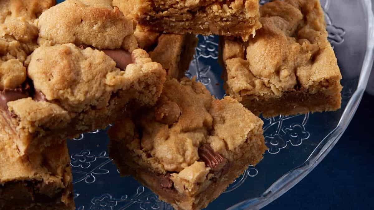 A platter of peanut butter bars with oatmeal.