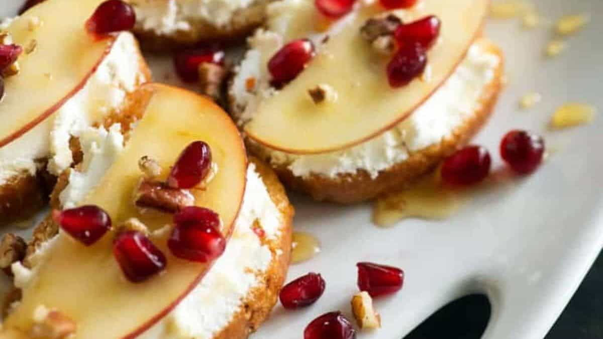 A platter of pomegranate crostini.