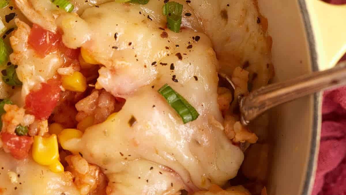 Southwest chicken and rice in a pot with a spoon.