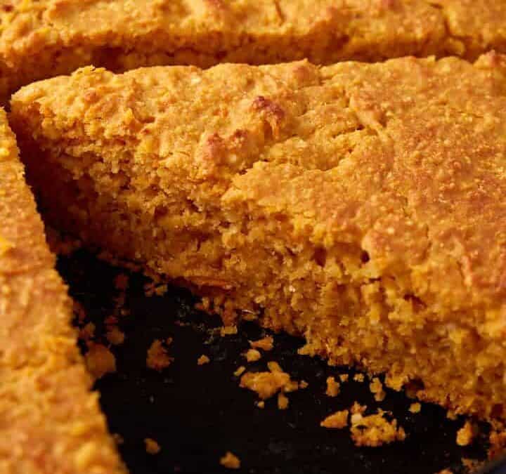 Cornbread baked in an iron skillet.