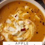 A bowl of creamy butternut squash and apple soup.