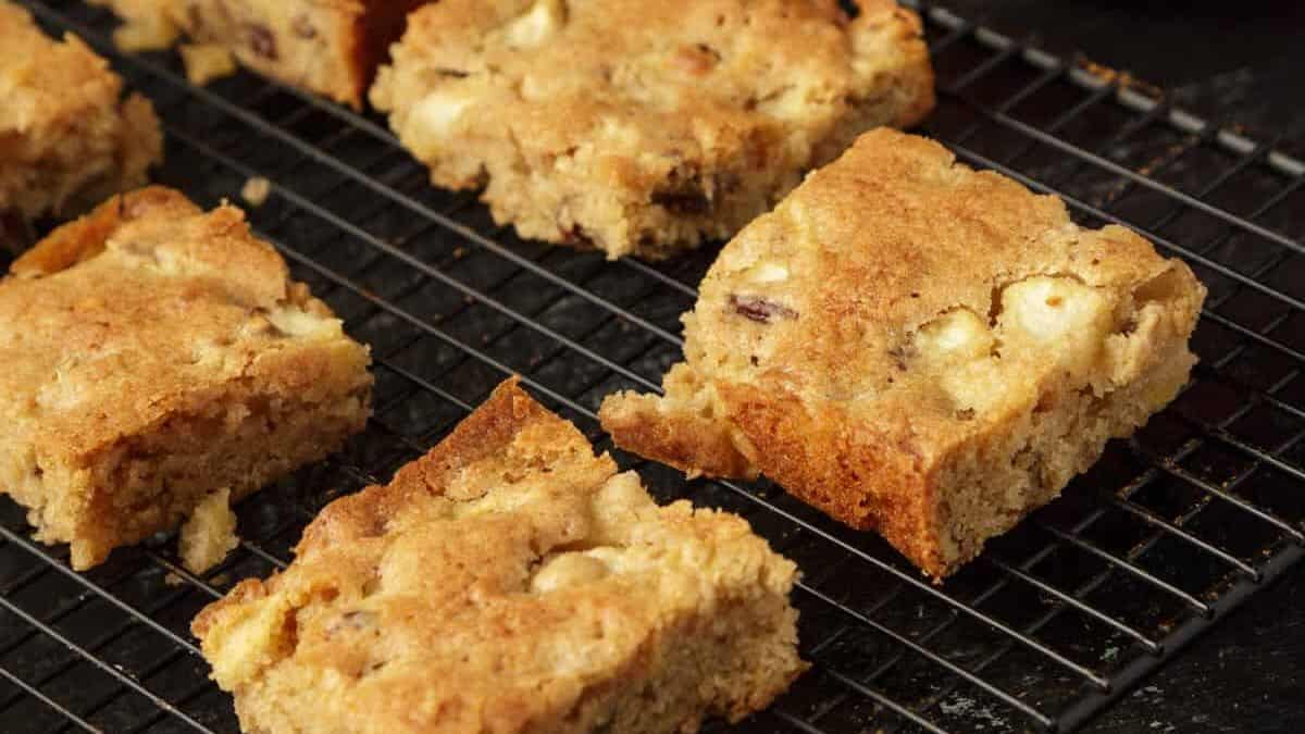 Apple blondies on a cooling rack.