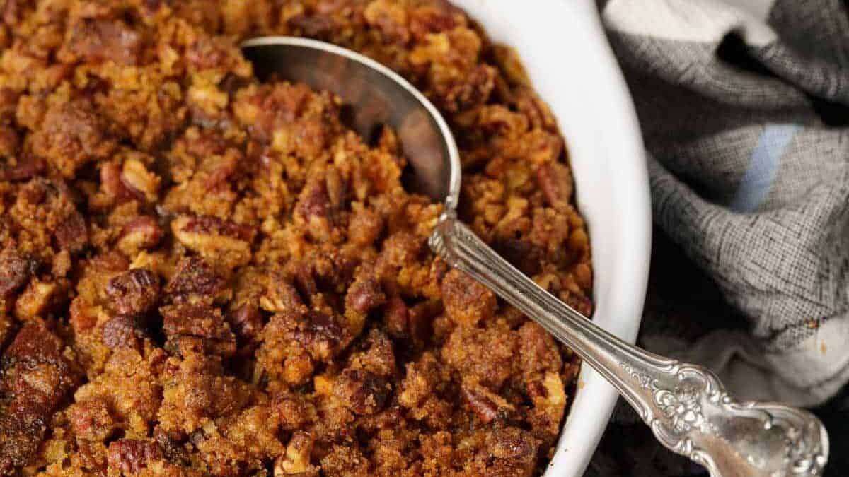 A casserole dish of mashed sweet potato casserole with bourbon.