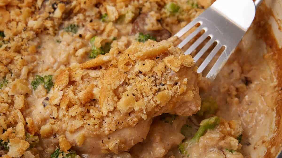 A skillet of chicken rice and broccoli casserole.