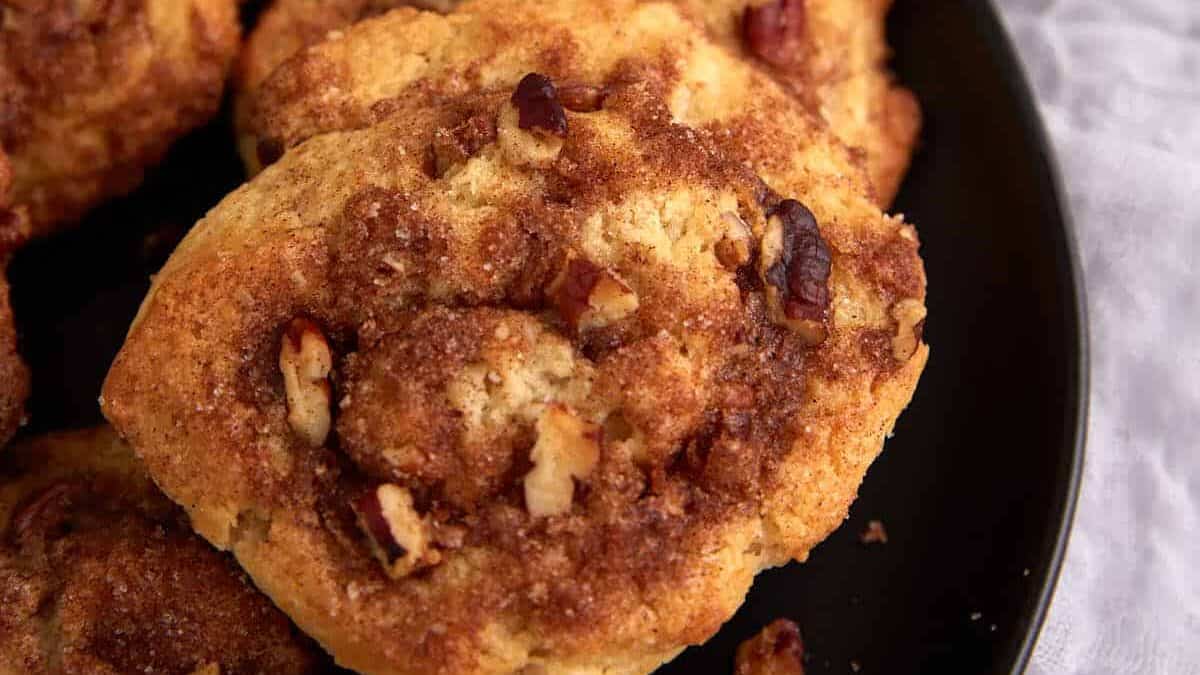 A plate of cinnamon roll biscuits.