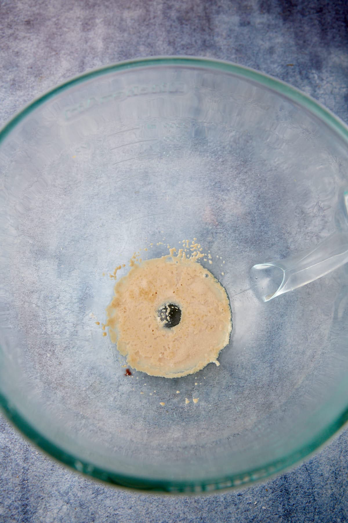 Yeast activated in a glass bowl.