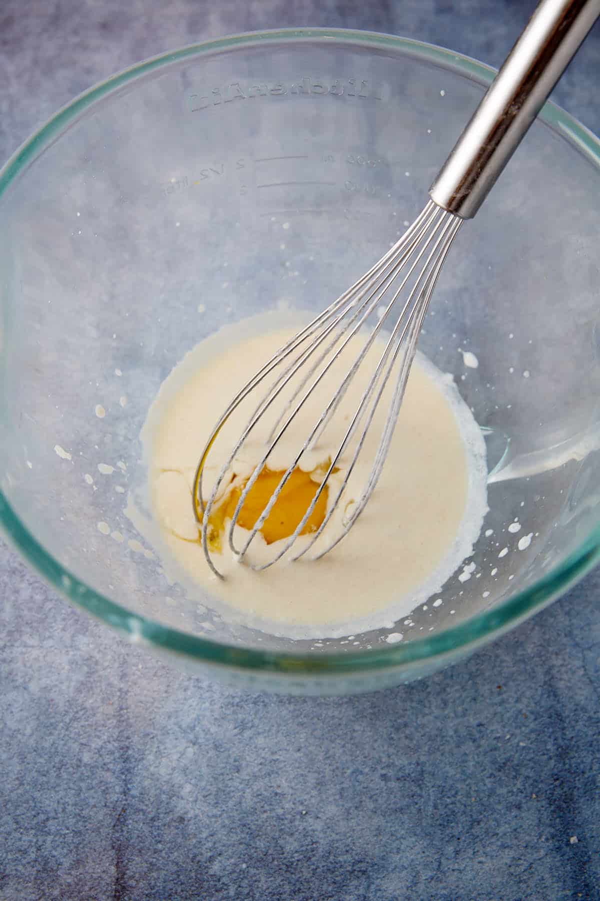 An egg added to the yeast mixture.