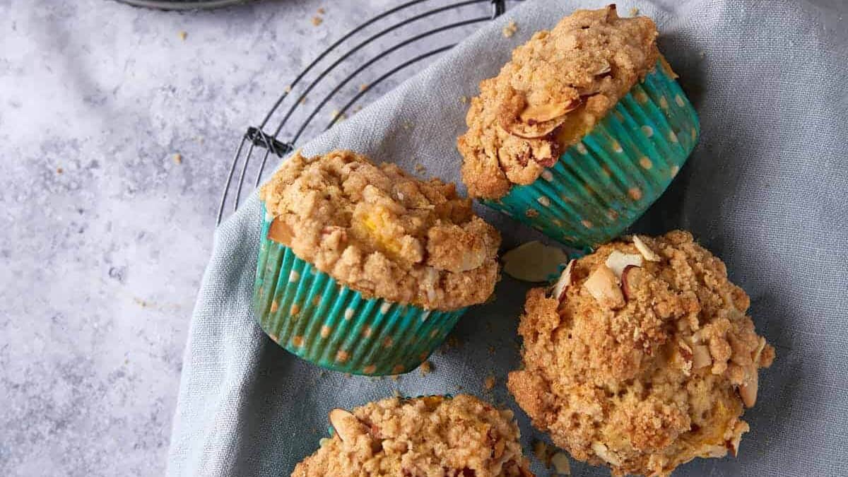 Peach muffins on napkin.