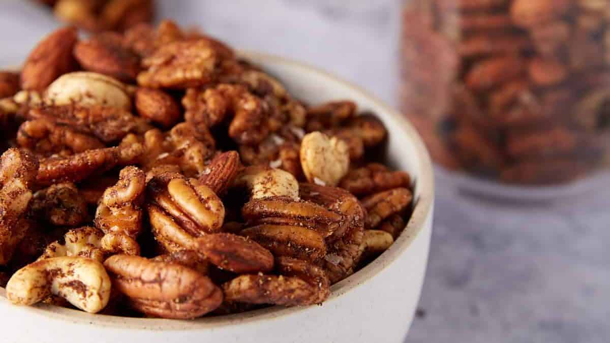 A bowl full of spicy roasted nuts.