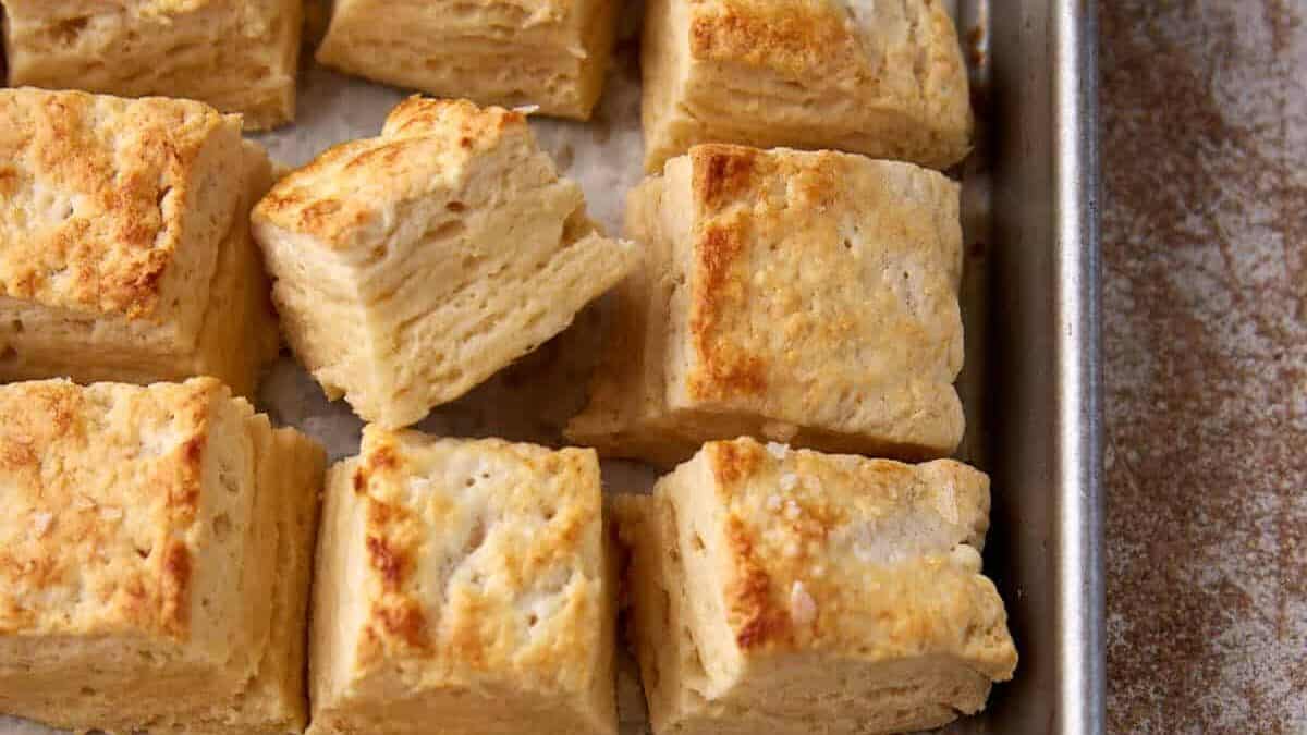 Square biscuits baked on parchment paper.