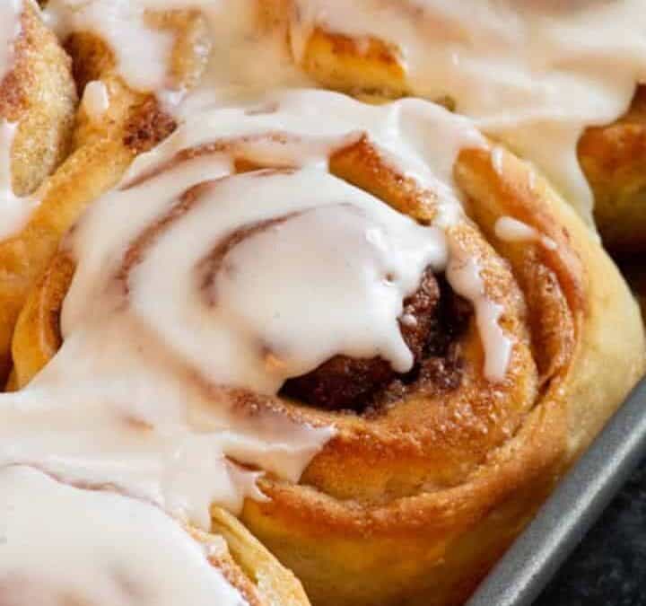 A baking pan filled with cinnamon rolls.