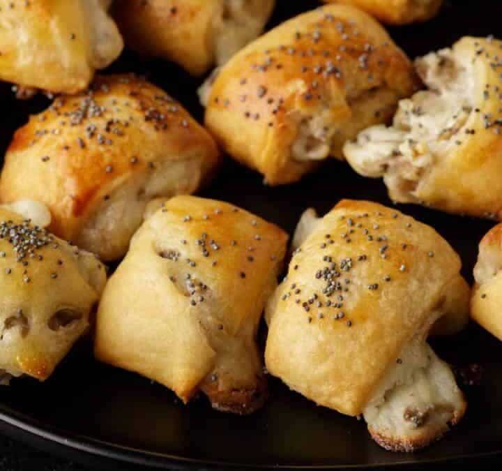 A serving platter with mushroom crescent rolls