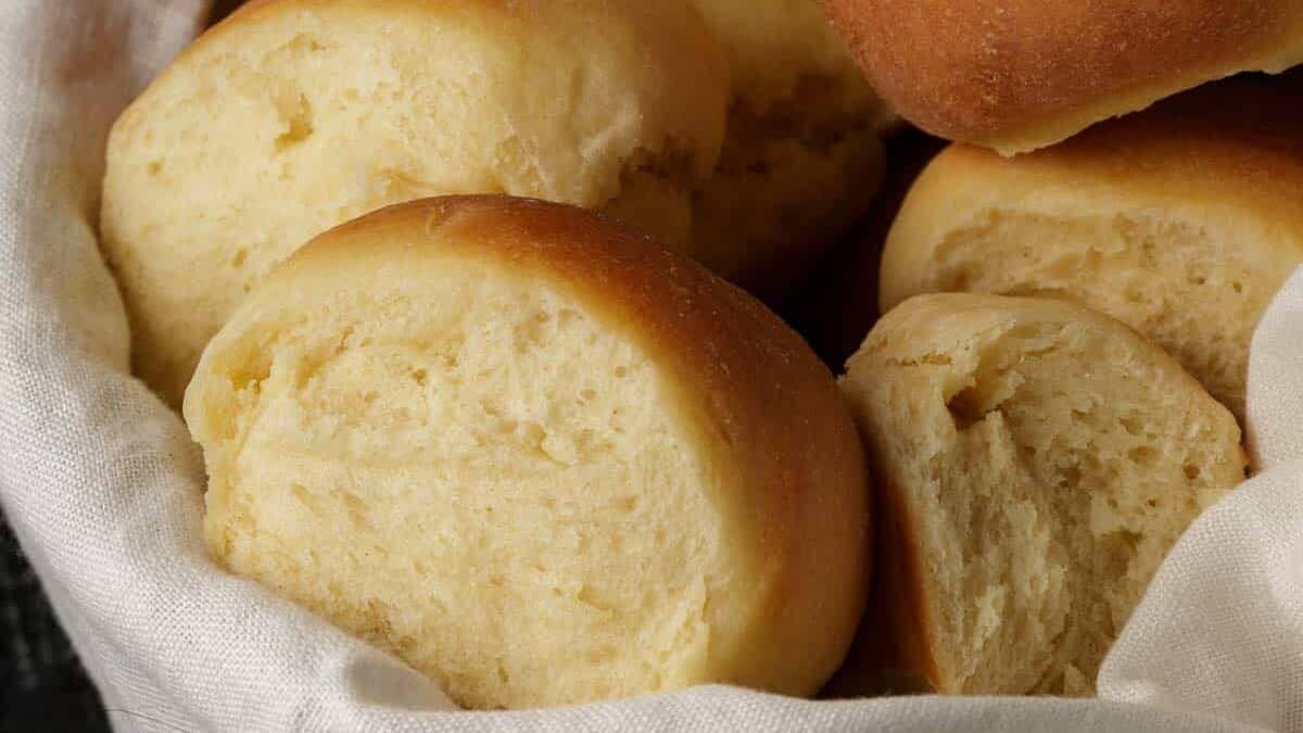 A basket full of Parker House rolls.