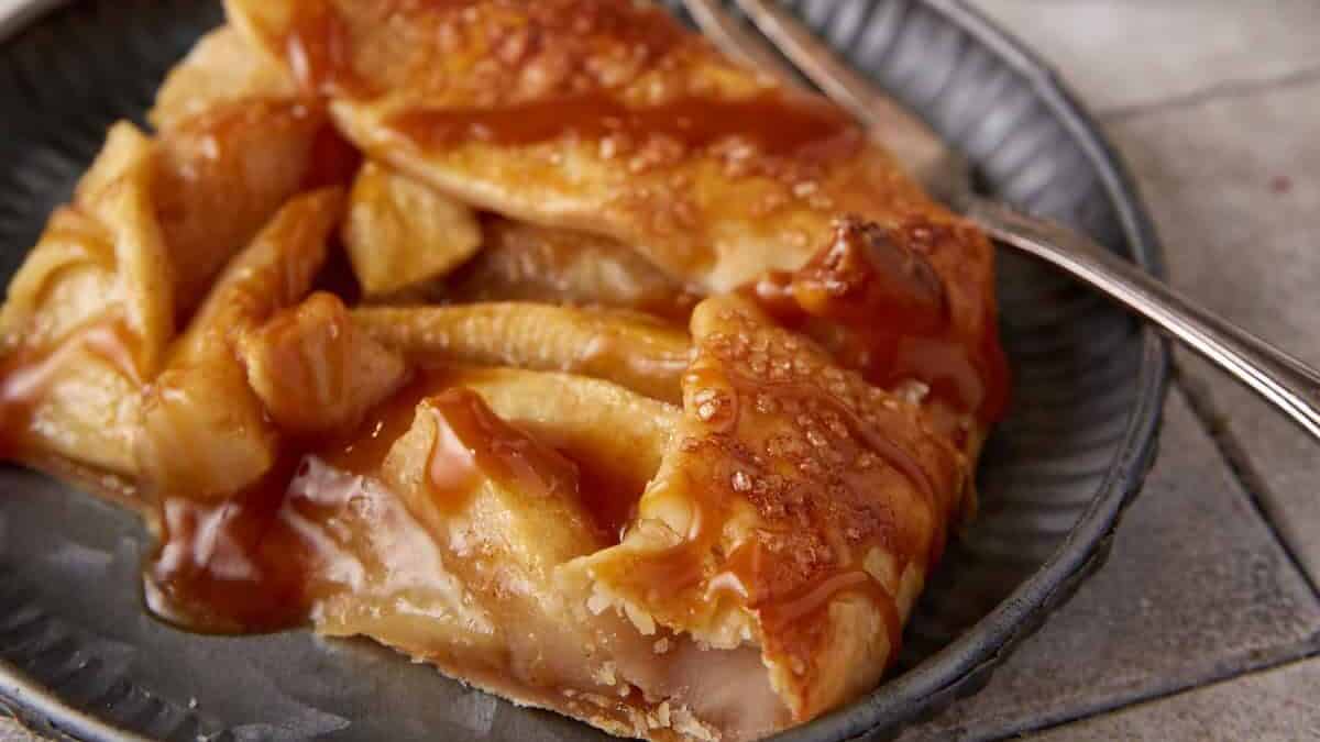 A slice of an apple and pear galette.