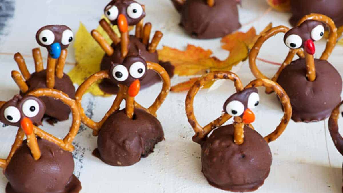 Oreo Turkeys with fall leaves behind them.