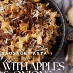 A bowl of sausage and apples pasta.