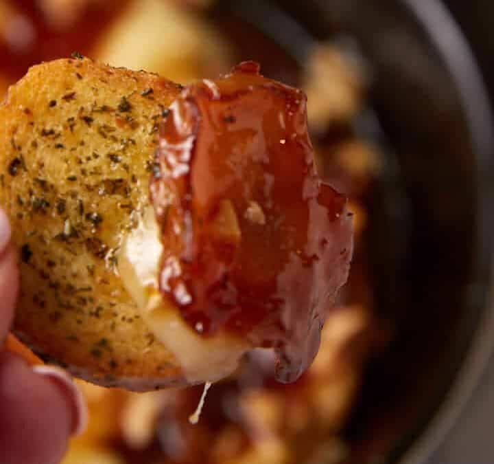 A crostini covered in brie and apples.