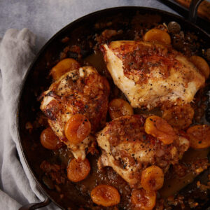 Apricot chicken in a skillet.