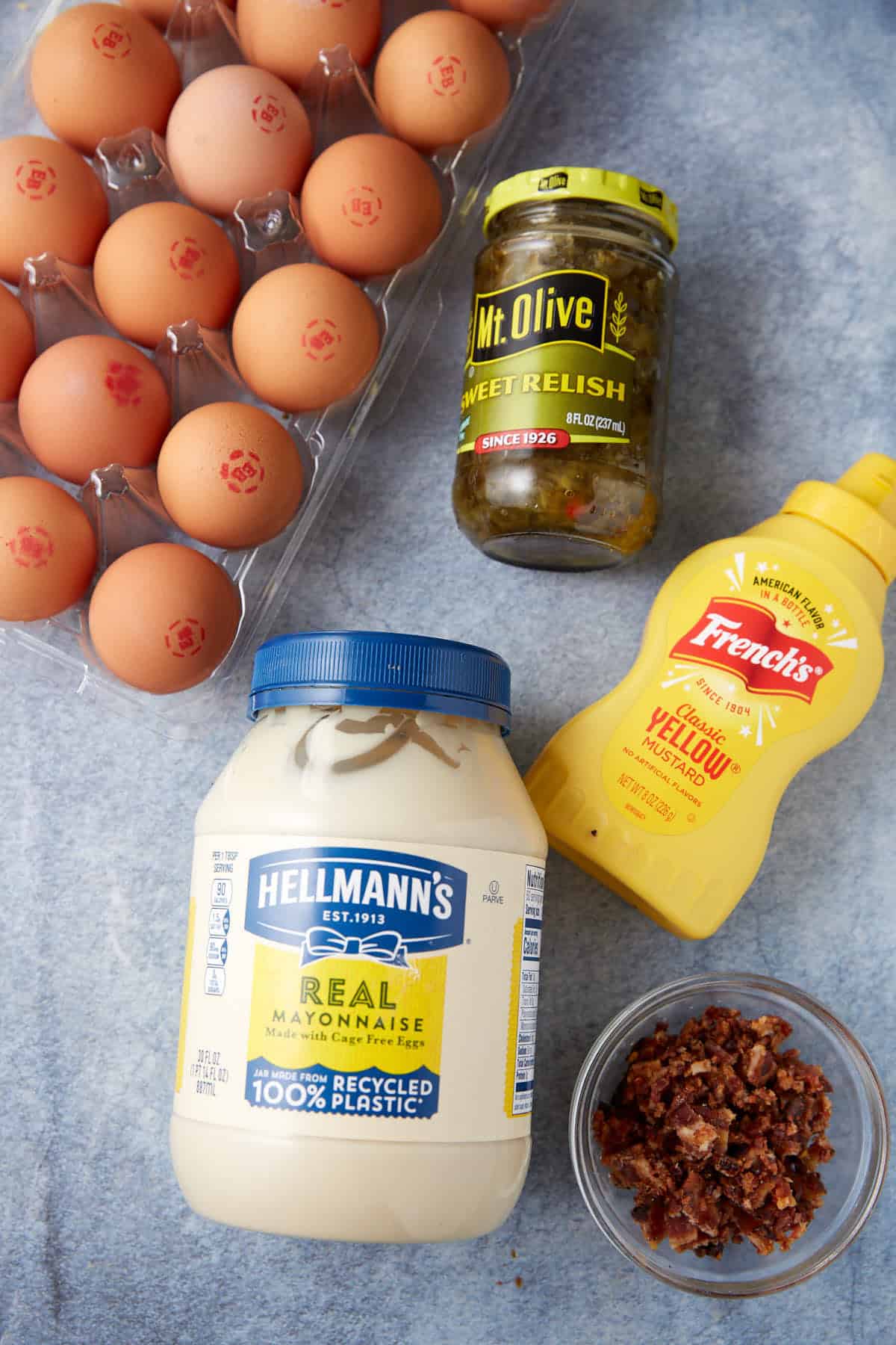The ingredients for deviled eggs with bacon.