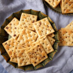 A plate of seasoned crackers.