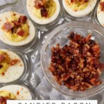 A platter of deviled eggs with bacon.
