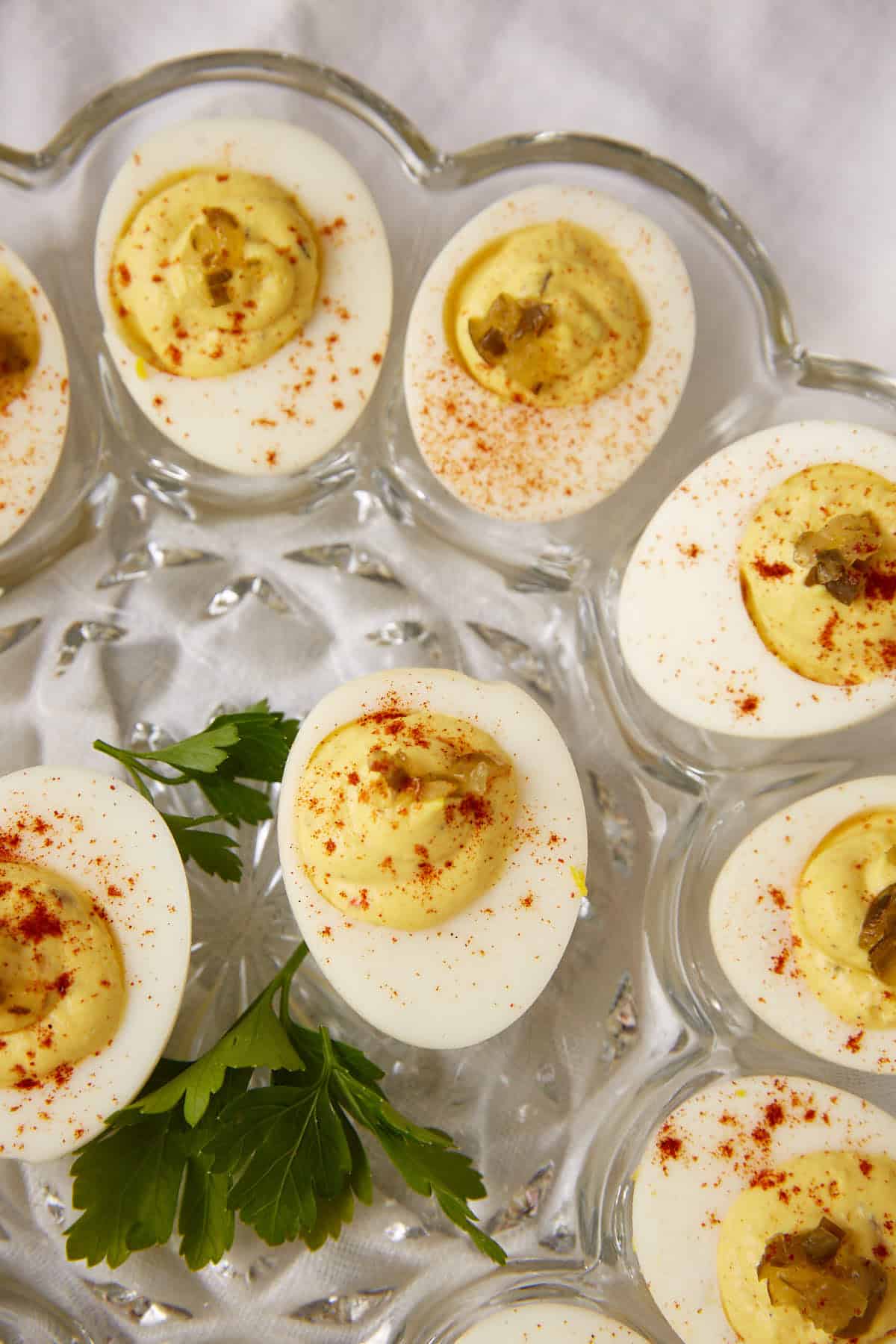 Deviled eggs sprinkled with paprika.