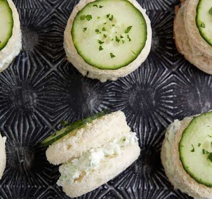 A tray of cucumber sandwiches.
