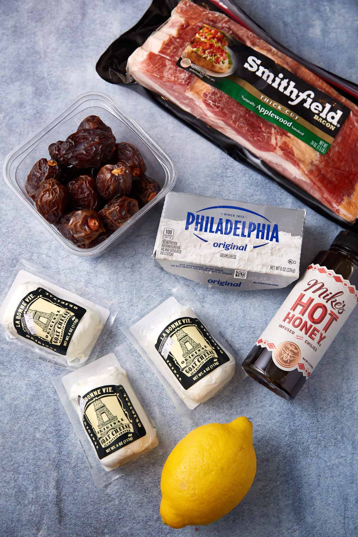 goat cheese dip ingredients on a gray background.