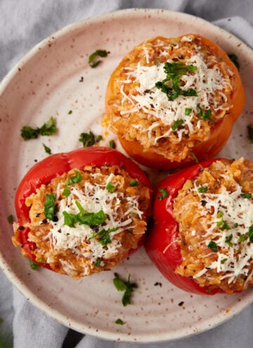 stuffed Italian sausage and peppers on a plate.