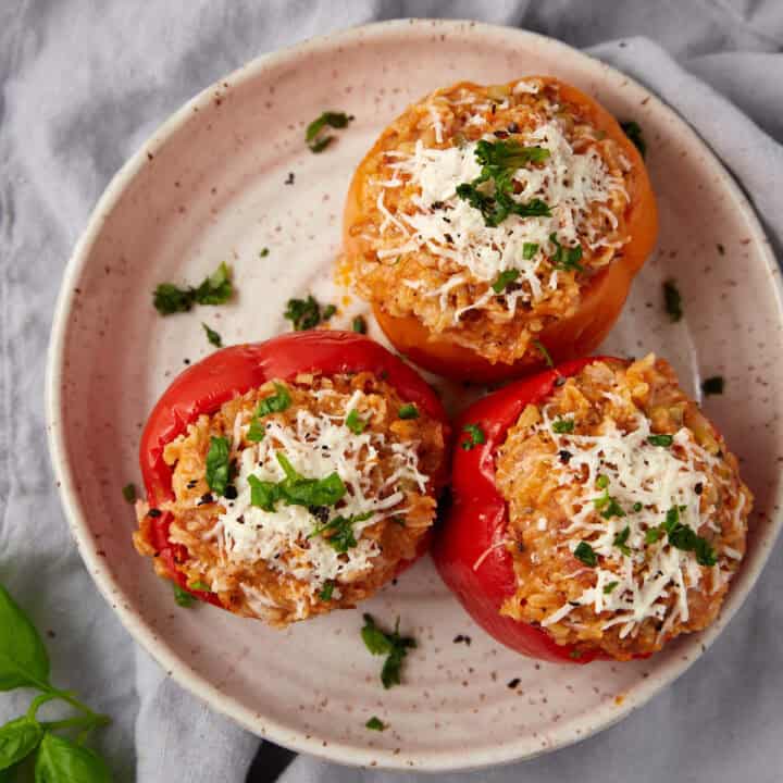 stuffed Italian sausage and peppers on a plate.