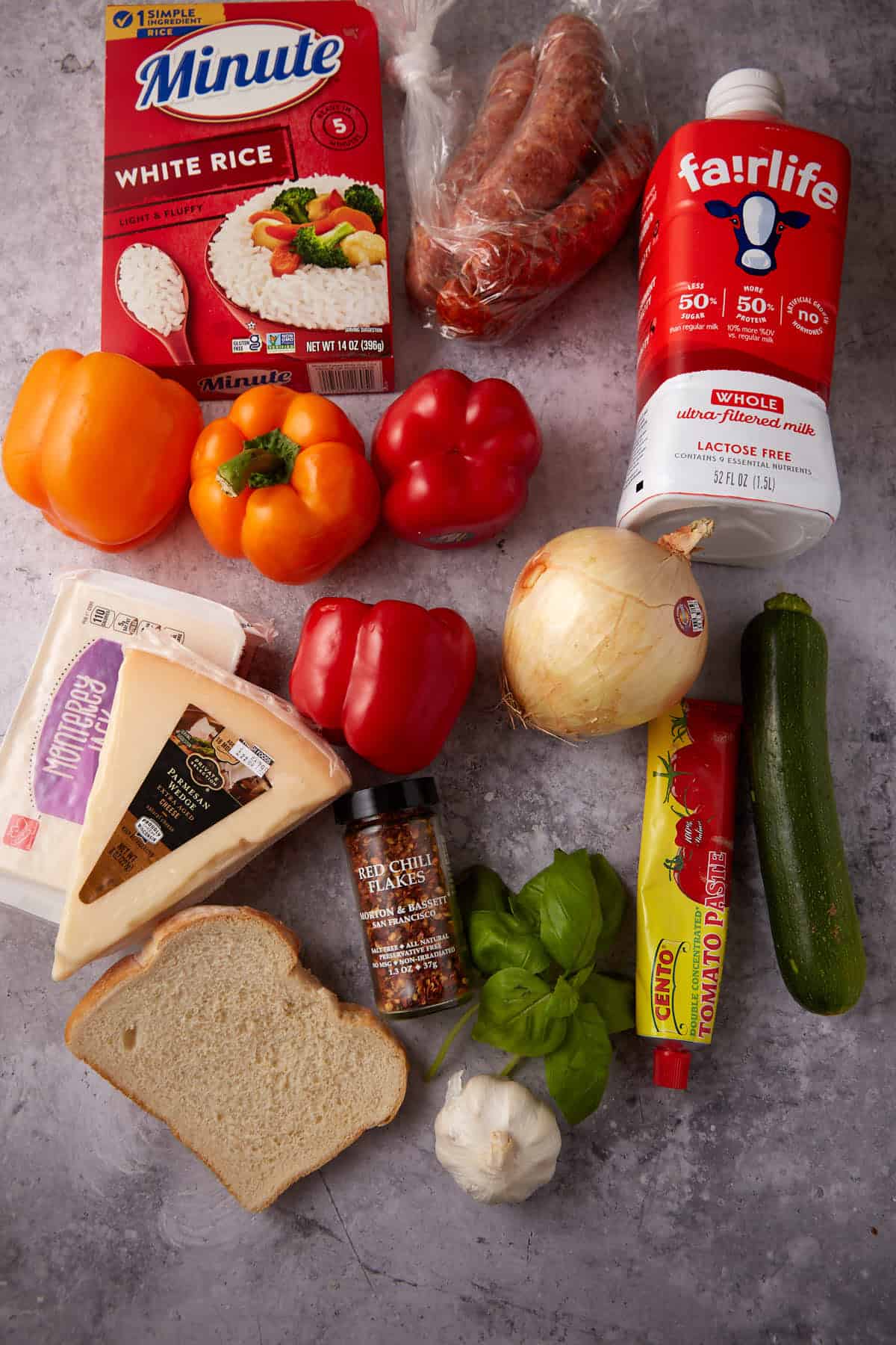 stuffed peppers ingredients on a gray background.