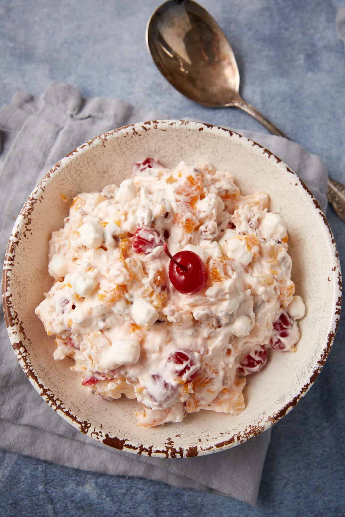 ambrosia salad in a white bowl.