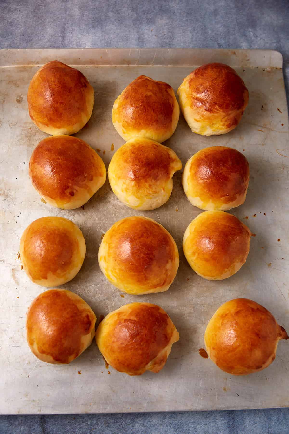 buttermilk yeast rolls on a baking sheet.