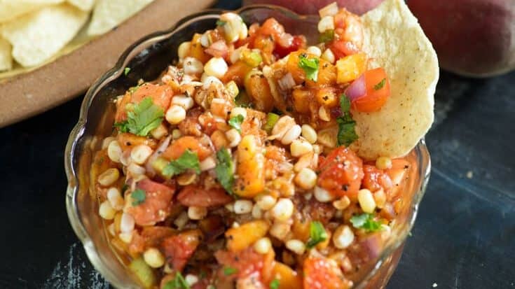 A bowl of Corn and Peach Salsa