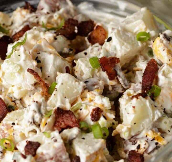 A clear bowl of ranch potato salad.