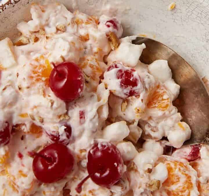 ambrosia salad in a white bowl.