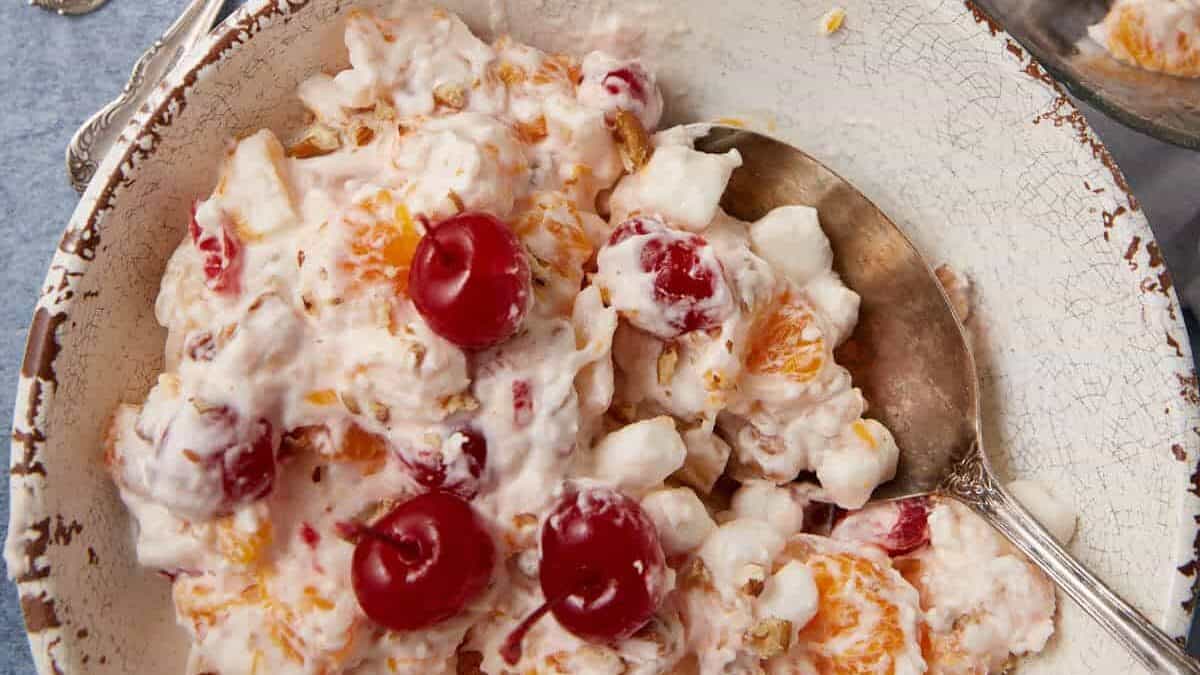 ambrosia salad in a white bowl.