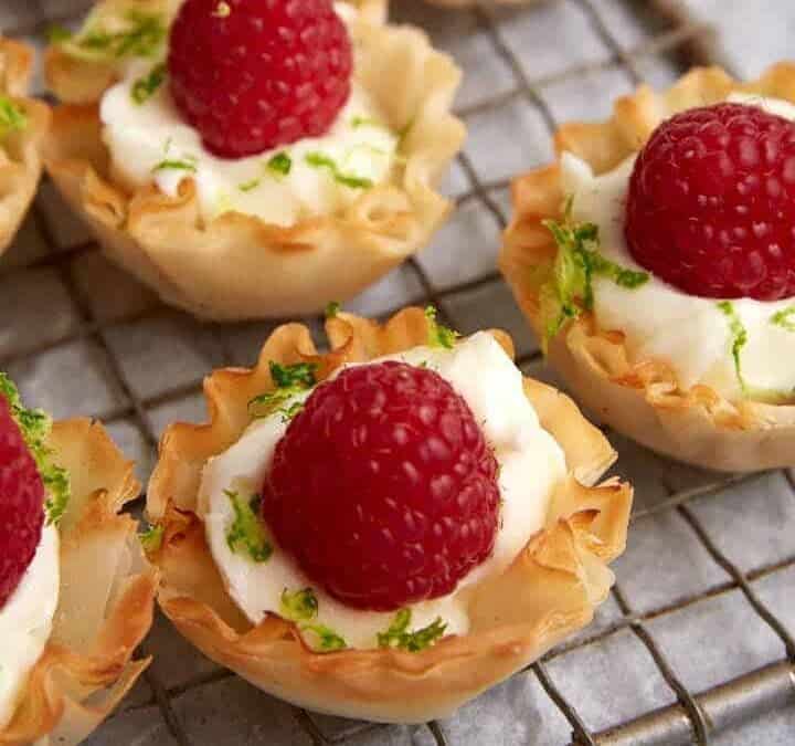 A tray of phyllo cup desserts.