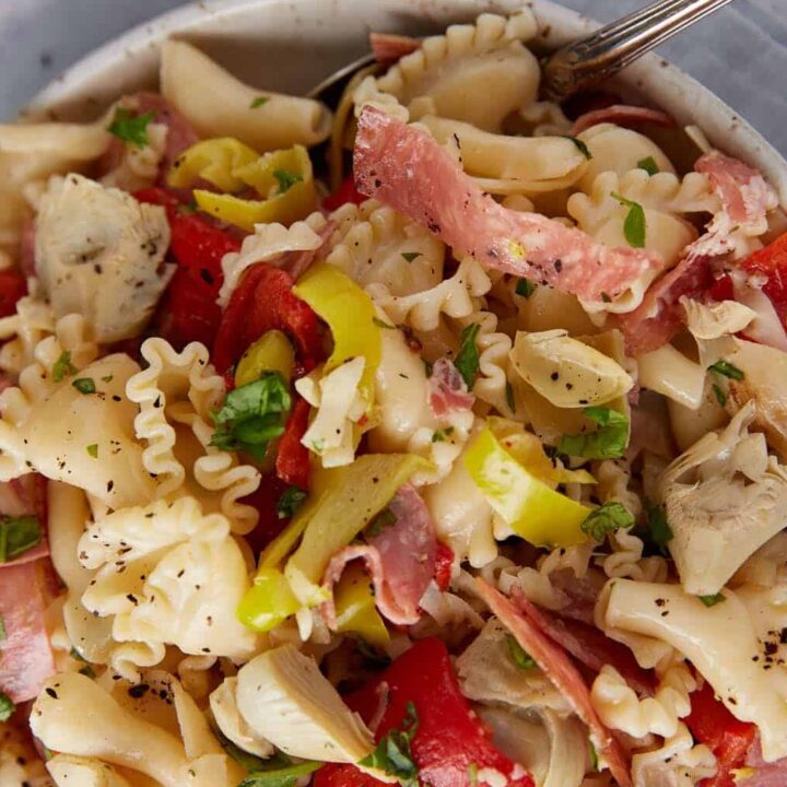 A large bowl of pasta salad.