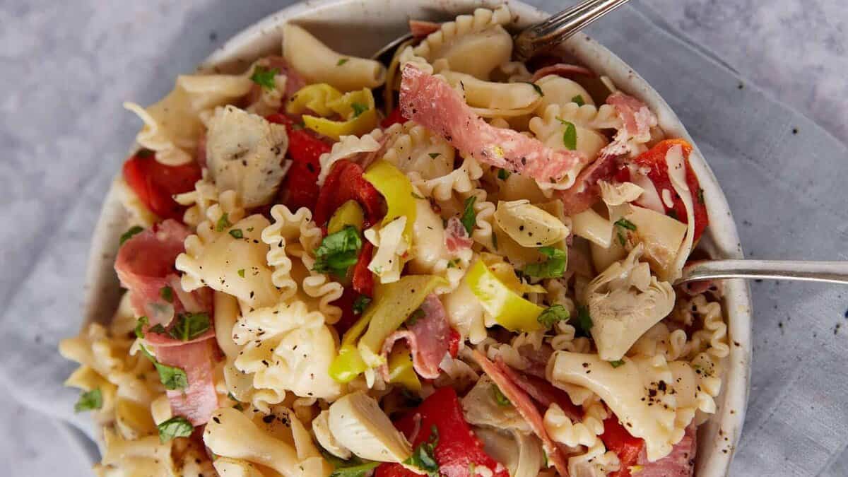 A large bowl of pasta salad.
