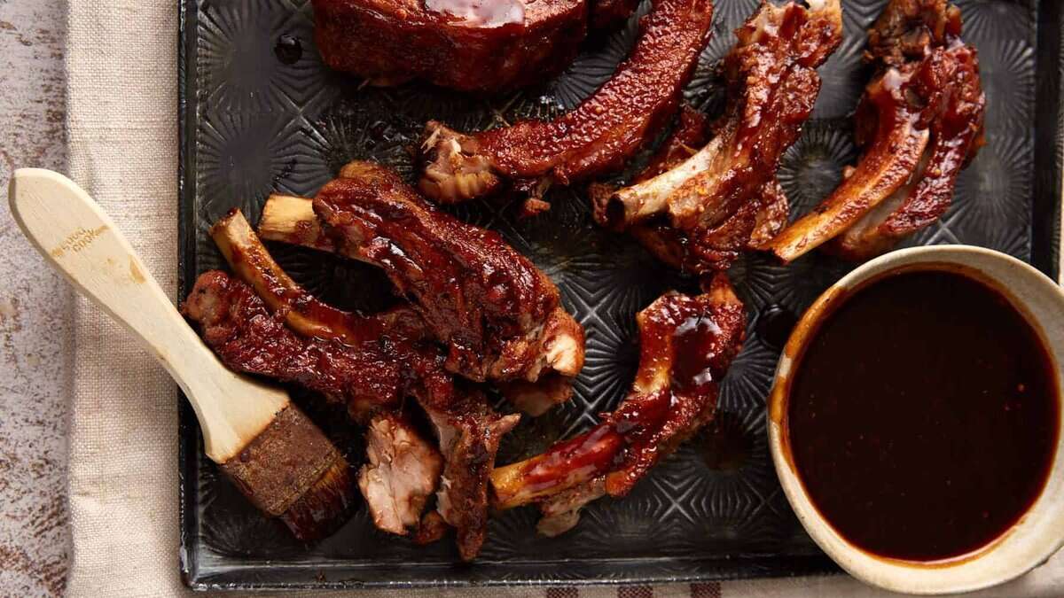 A platter of baby back ribs.