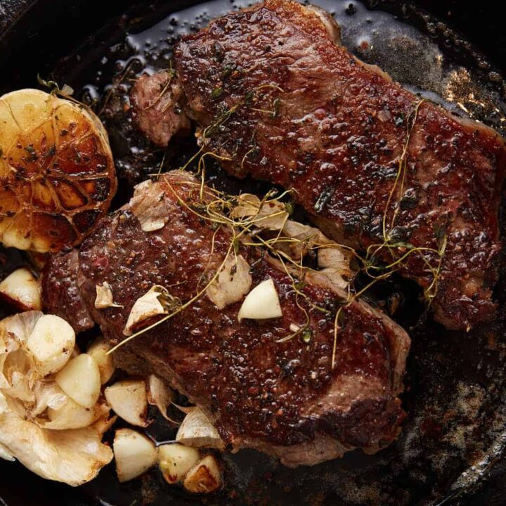 Steaks after they have cooked in the oven.
