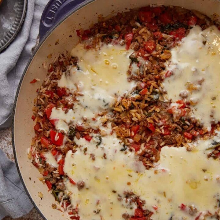 A skillet of cooked hamburger rice casseroel.