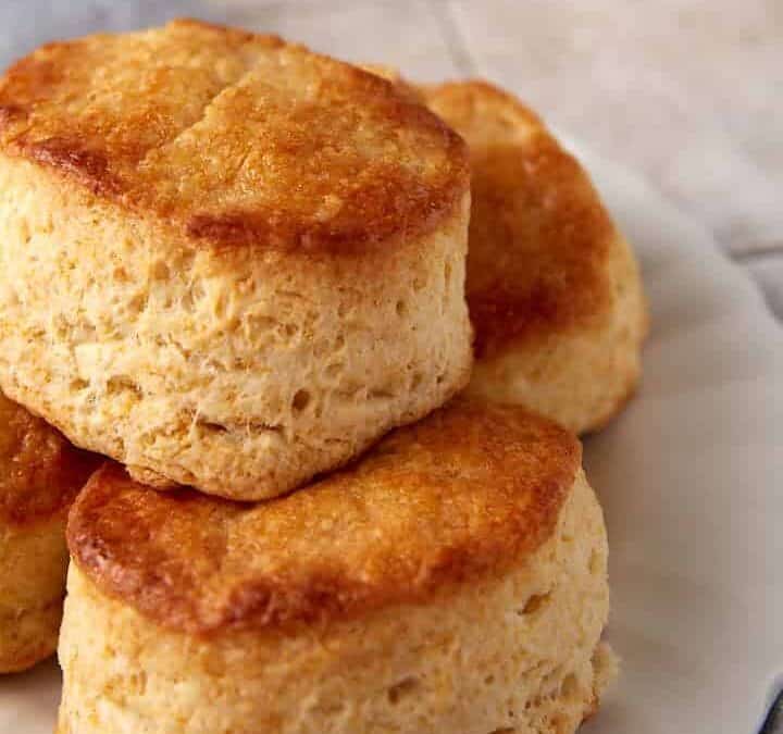 A plate of honey butter biscuits.