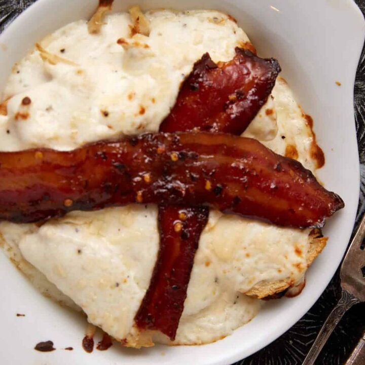 A ramekin with a baked Kentucky hot brown.