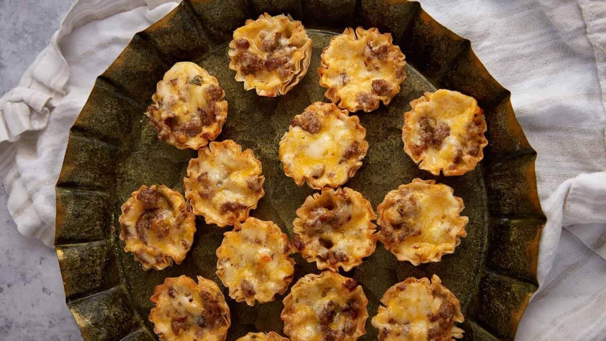 A platter of sausage cups.