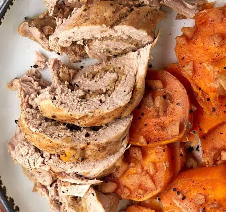 Sweet potatoes and pork on a platter.