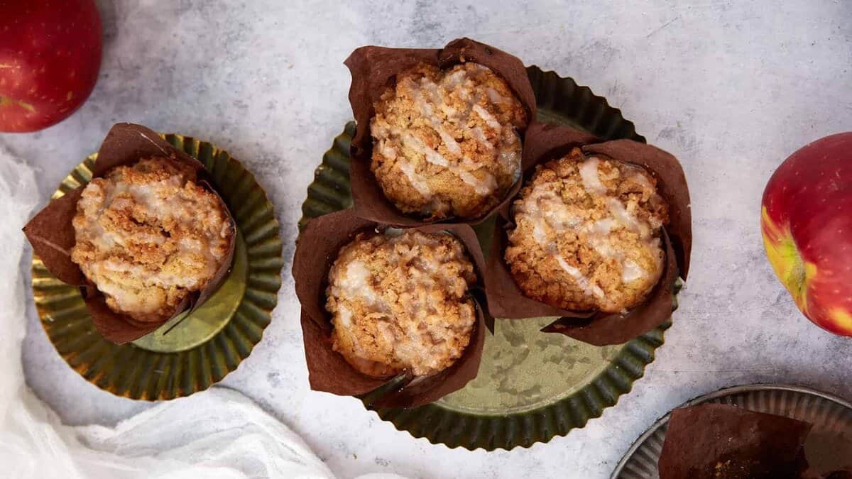 Small plates of spiced apple muffins.