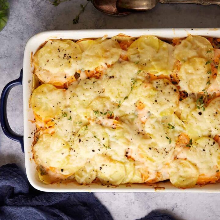A casserole dish of scalloped sweet potatoes.