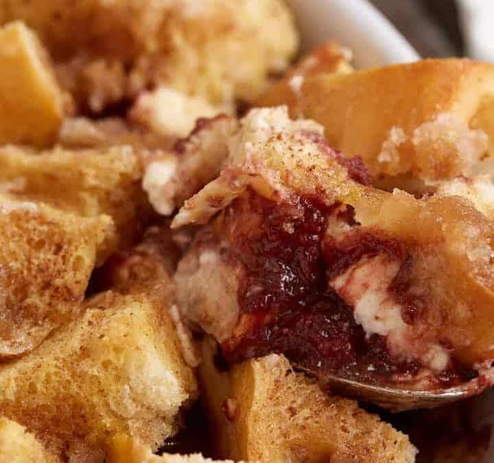 A spoon full of overnight baked French toast.